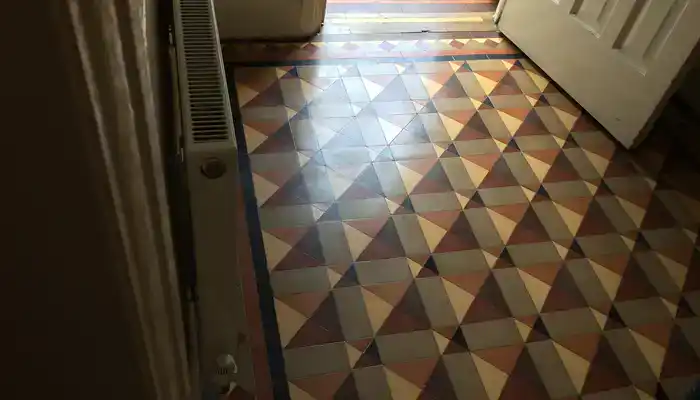 Restored Minton tile floor in Tutbury with clean tiles and revived original colours