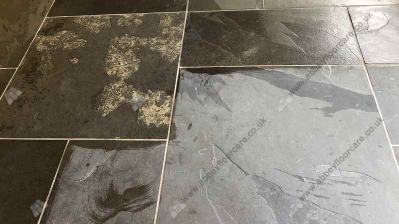 Applying sealer to slate floor during restoration in Barrow-in-Furness